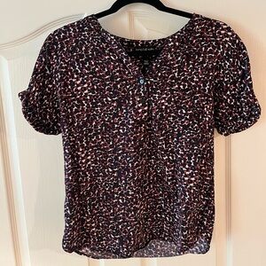 Long tall sally brown, white, and cream patterned short sleeved top. US size 6